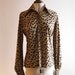 1970's leopard print wide collared womens shirt in soft silky polyester, size 10