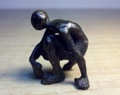 Crouching Small bronze figure