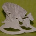 Beautiful handmade miniature wicker baby rocker