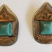 Large dramatic earrings signed by the artist and perfect for your next exotic vacation.