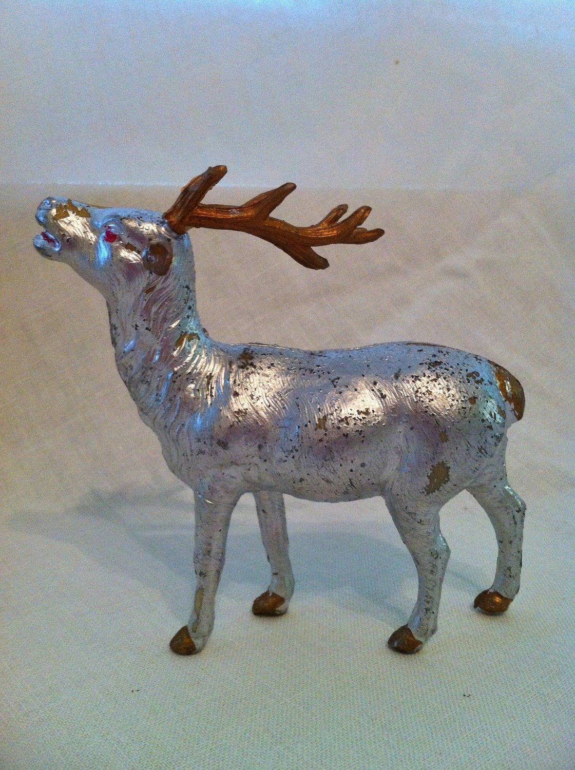 large silver reindeer figurines