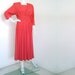 1980s does 1940s coral pink dress with corselet inspired waistline by Nina Piccalino