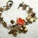 Brass Butterfly Bracelet, pearls with orange flower - brass charms