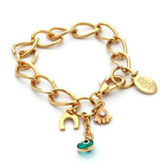 Items similar to Gold Link Bracelet with Good Luck Charms on Etsy