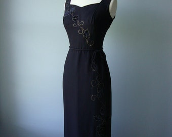Vintage 1960s Bombshell Dress // lovely detailing