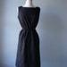 R E S E R V E D 60s vintage black eyelet dress// wiggle dress