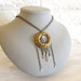 Jules Verne Steampunk Pendant with brass Cogs and Crystals- a tribute to one of my favorite authors