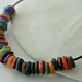 Rainbow shell necklace, leather, sterling silver