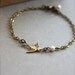 A Tiny Oxidized Brass Flying Swallow Bird with Swarovski Ivory Pearl Bracelet. For Her. Gifts for Bridesmaids Bracelets. Maid of Honor.