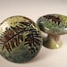 2 Hemlock ceramic cabinet door knobs/drawer pulls in green leaf glaze