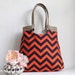 Orange navy blue chevron carry on hobo bag with burlap