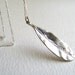 Silver leaf pendant necklace on delicate silver plated chain, matte finish