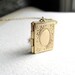 Gold book locket necklace on long 14k gold plate chain, etched engraved