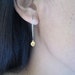 Teeny Tiny GOLD mini Skull charms on SILVER hoop earrings so dainty and cute