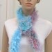 SALE ITEM -Scarf/boa,handknitted,in shades of turquoise and multi pastel colors of fun fur yarn, with silk and velvet ,rhinestone floral