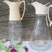 Vintage Atomic Midcentury Decanters-Modern-Two-Starburst-Syrup Bottles from Tessiemay