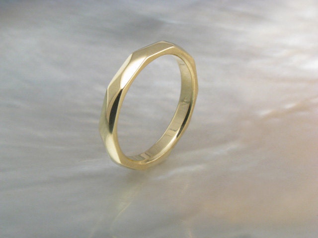 Faceted wedding rings