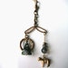 reserved for wenova thru 3/6 assemblage necklace balances w/ victorian gold findings + moss agate + lamb green gold pine hunter fob triangle