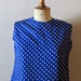 vintage 1950s blue and white polka dots top