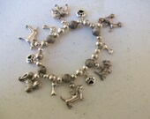Dog Charm Silver Bracelet Bone Paw Print Great Dane Pomernian Poodle Dashshund Scotty Bulldog Dog Charm Silver Bracelet Bone Paw Print Great Dane Pomernian Poodle Dashshund Scotty Bulldog