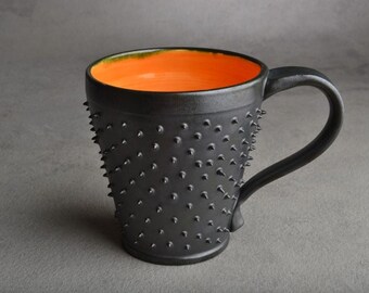Spiky Coffee Mug: Made To Order Black and Orange Dangerously Spiky Coffee Mug by Symmetrical Pottery