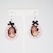 Courtney Love Kinderwhore Pink Glitter Earrings with Black Bows