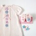 Knitted pink dress and little shoes with little flowers. 100% cotton. READY TO SHIP size newborn.