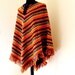 1970s Burnt Orange Aztec Stripe Sabra Fringed Poncho