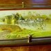A Serving Tray with a Picture of a Stagecoach and Posts and Bars around the Rim - Made in Germany