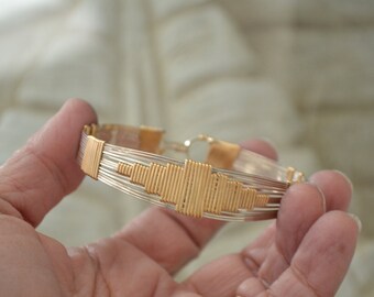 Southwestern wire wrapped bracelet in Sterling Silver and 14K gold filled.