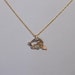 Whitaker's Black Hills Gold Petite Dolphin Pendant