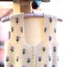Vintage embroidered vest, handmade with white wool. Folk style.