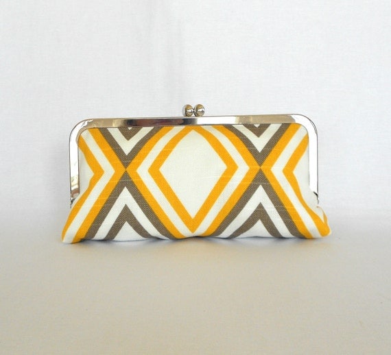 yellow and white clutch