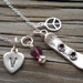 Snowboarding necklace/key chain.....Great necklace for your favorite snowboarder... hand stamped in sterling..