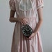 reserved... 1950s Little Girls Dress . Pale Pink . Eyelet Lace . Bib Front . Kids . Childrens . Peter Pan Collar