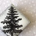 Evergreen Brooch. Snowy White Glaze on Black Porcelain Square. Pine Tree. Winter Scene. Woodland. North Woods. Spruce. Fir. Nature. Rustic