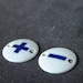 More or less. Vintage porcelain tags.