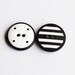 16 Vintage 13/16" Plastic Black and White Striped 2 Hole Buttons. Item 0054P