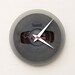 clock made from a recycled magnetic tape reel