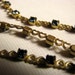 Vintage brass heart chain with blue rhinestones - 16.5 inches