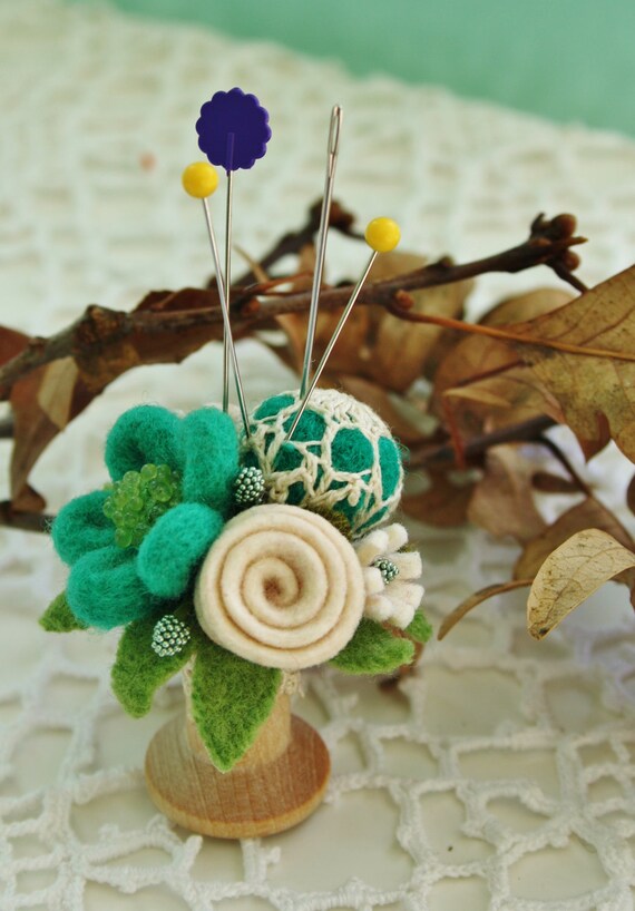 Vintage doily and spool pincushion