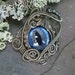 SOLD Gothic Botanical Steampunk Evil Eye Pendant in Sable and Blue