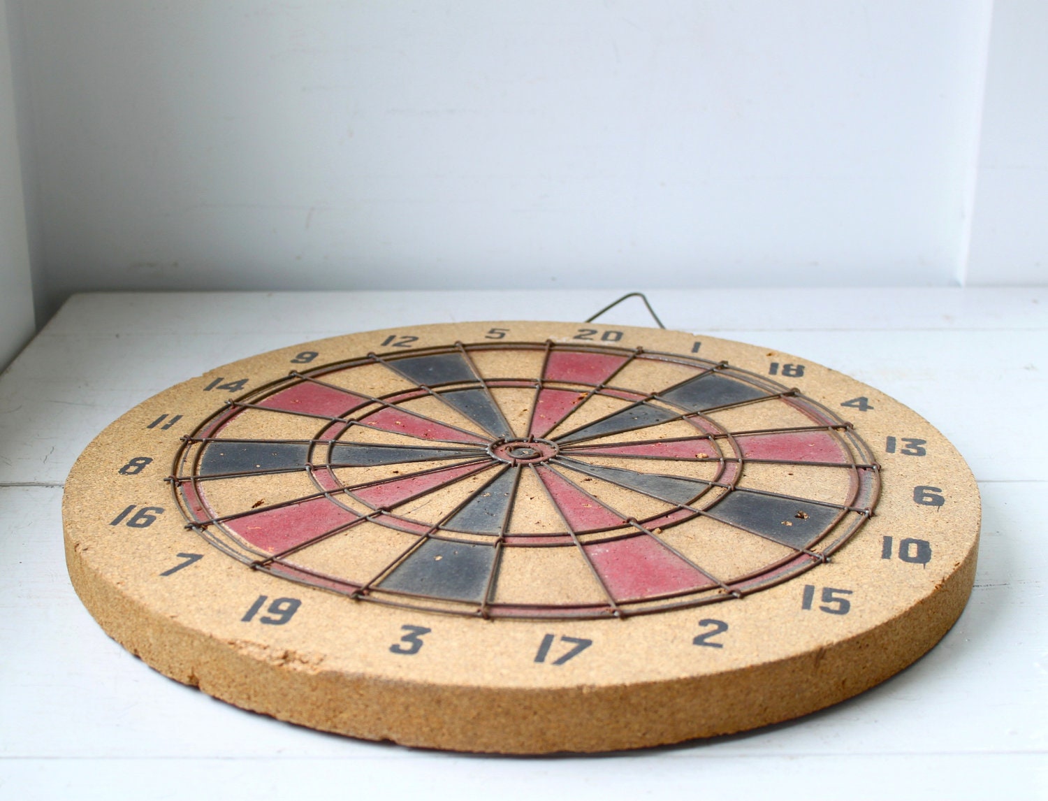 vintage 1950s dartboard by Sportcraft. With archery target.