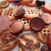 Vintage Buttons - mix of peachy amber pinks, pearlized, assorted styles and sizes, lot of 26 (2353)