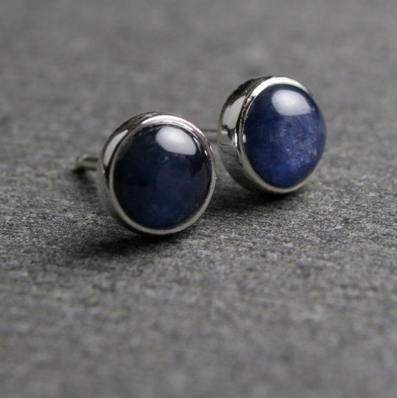 Bezel set blue sapphire cabochon and sterling silver stud