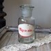 Vintage APOTHECARY bottle jar, large pharmacy bottle clear glass with etched lid and painted label Migraenin