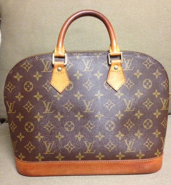 Vintage Authentic Louis Vuitton Alma handbag purse Made in