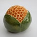 Green and Orange Ceramic Emerging Poppy Bloom Garden Wall Pod
