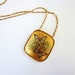 Vintage gold necklace. Butterfly pendant. Daisy flowers. Retro and pretty. Flower power. Amber and orange damascene