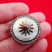 Vintage 1940s 1" Art deco mother of pearl and silver brooch-patent dates to 1943